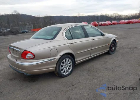 2003 Jaguar X-Type 2.5L Auto/2.5L Manual z USA, uszkodzony, nr VIN SAJEA51D73XD42031
